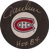 Autographed Montreal Canadiens Puck Jacques Lemaire